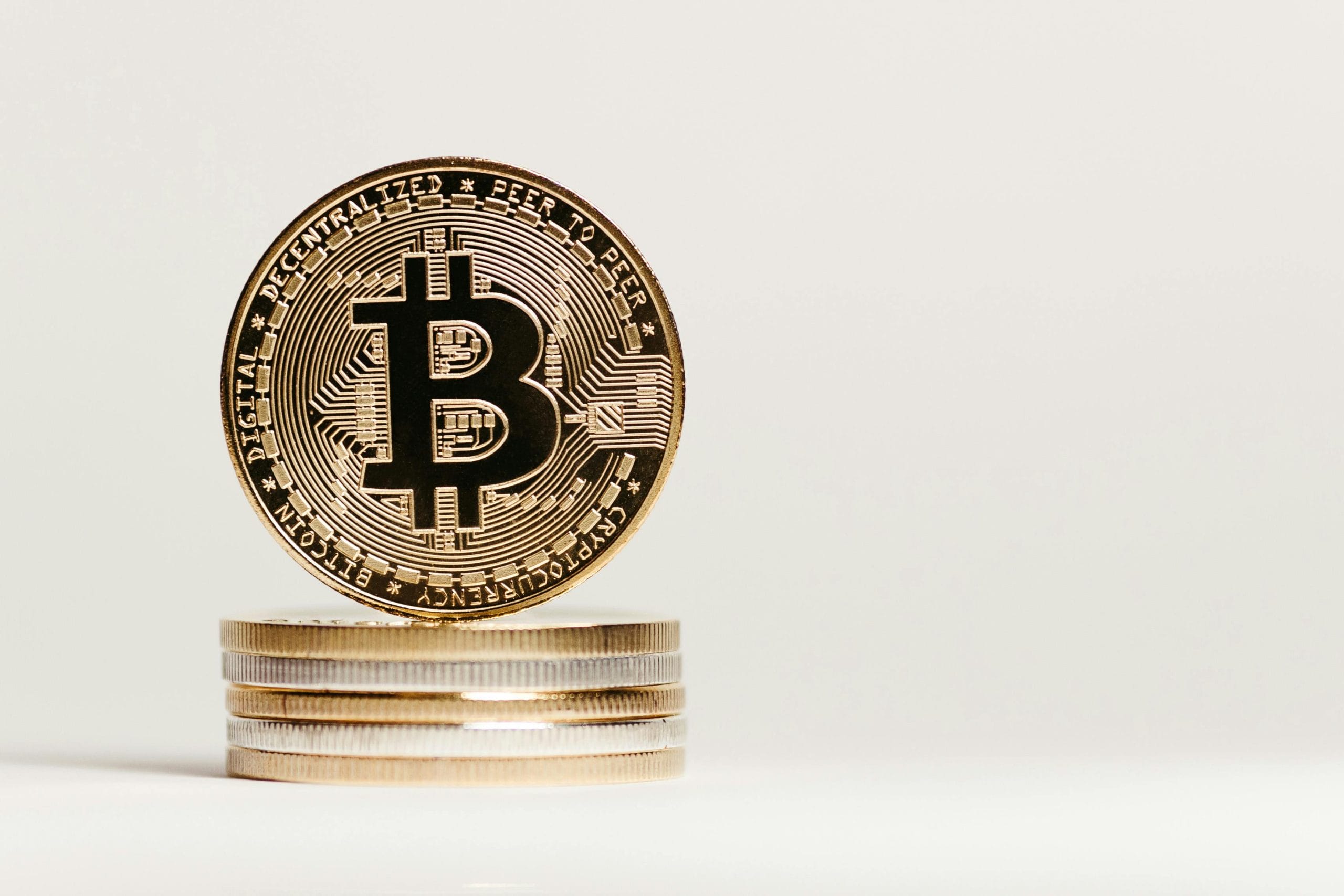 Picture of crypto coins on top of eachother.