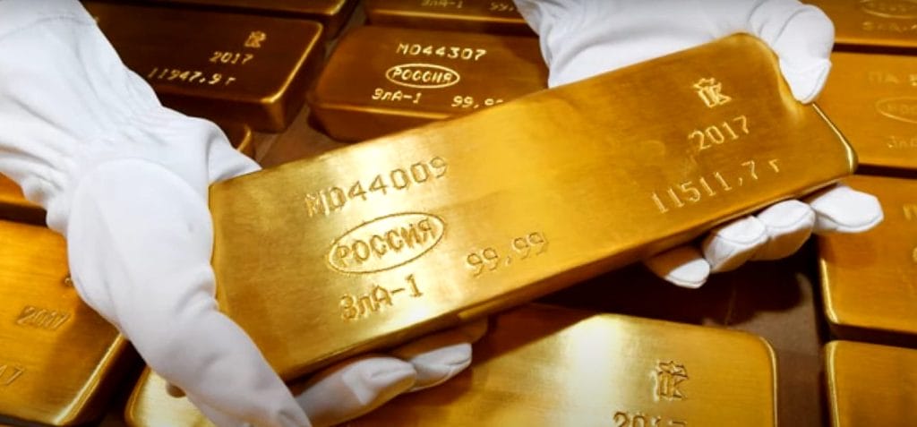 Gold bars embossed with a stamp that reads “Russia.”