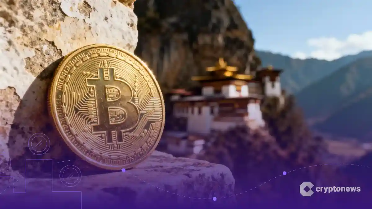ブータンの寺院を背景に置かれた、デジタル回路模様が刻まれた金貨のクローズアップ